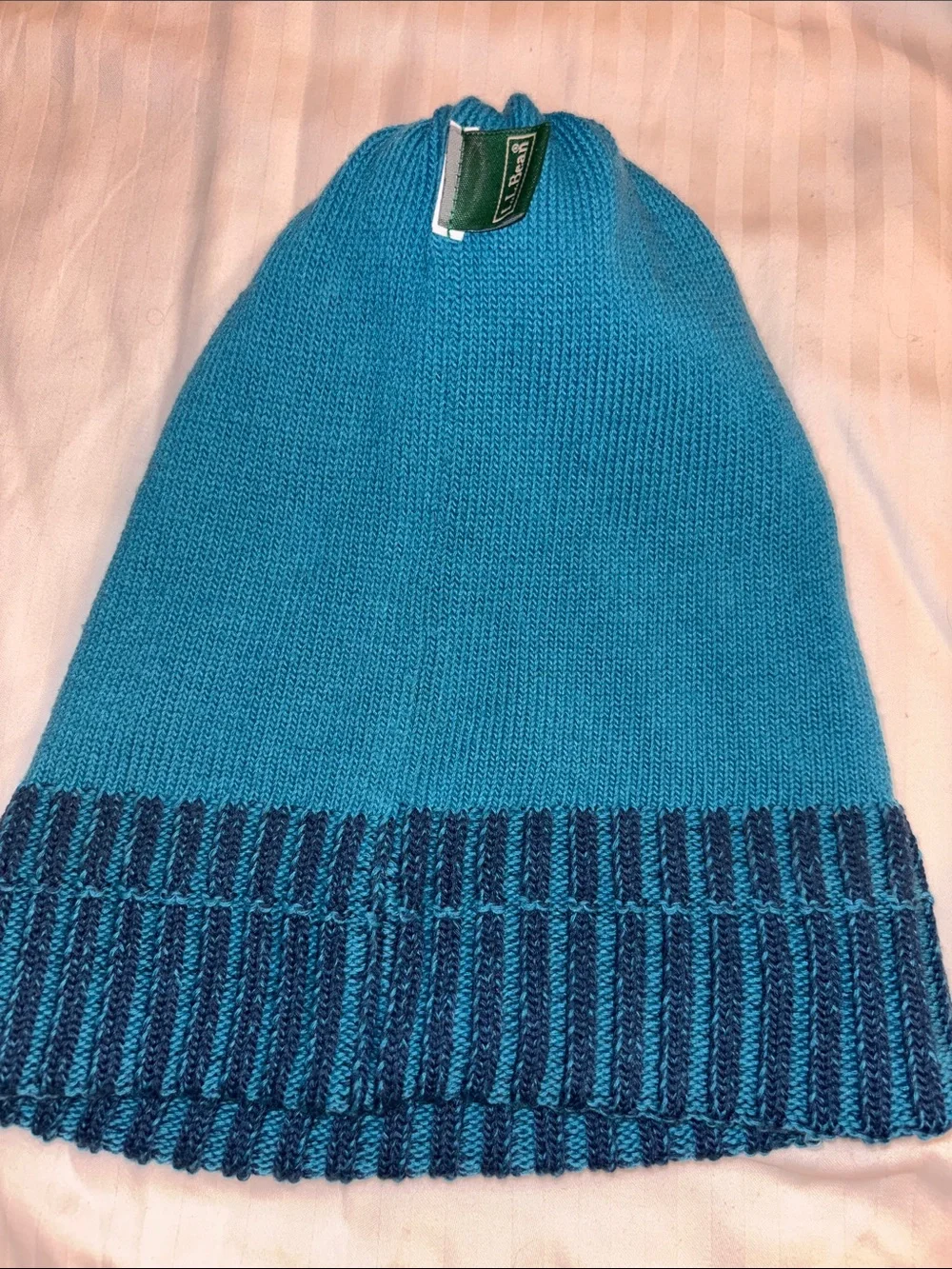 L.L. Bean Women’s Cable Knit Beanie in Teal and Navy